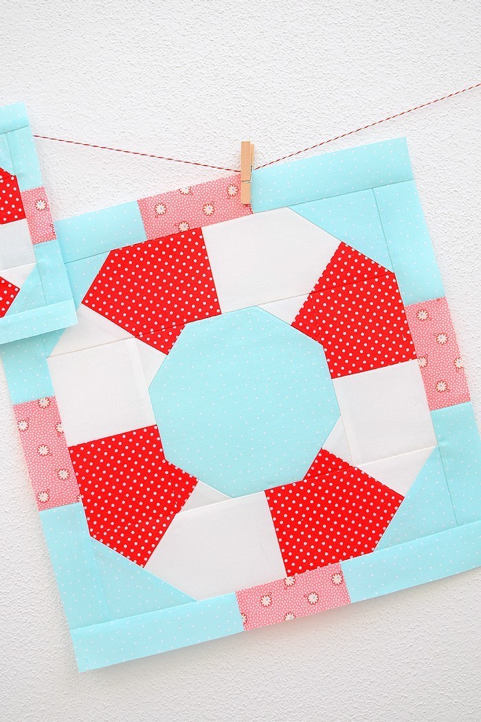 12 Inch Lifesaver quilt block hanging on a wall