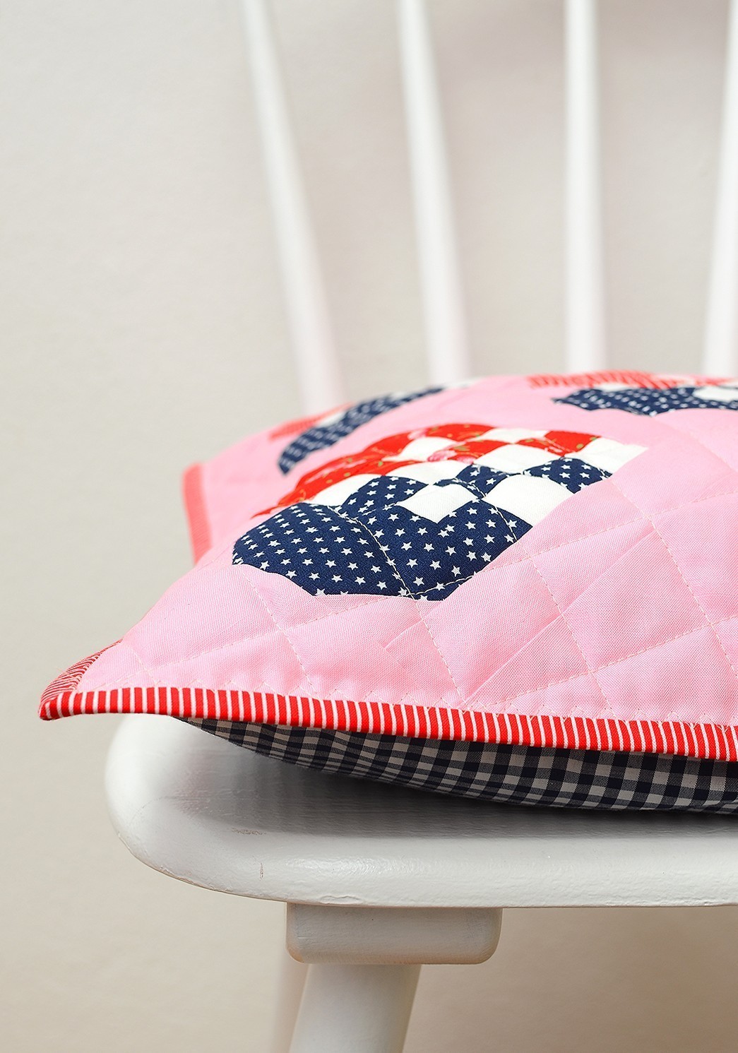 Patriotic pillow with hearts in red, white and blue