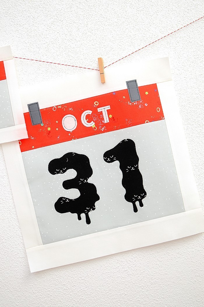 12 Inch Calendar quilt block hanging on a wall