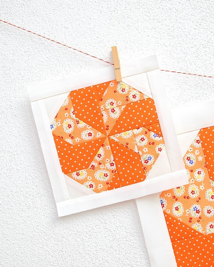 6 Inch Candy quilt block hanging on a wall