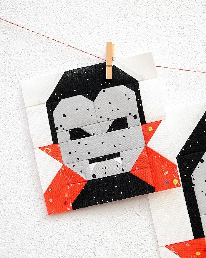 6 Inch Dracula quilt block hanging on a wall