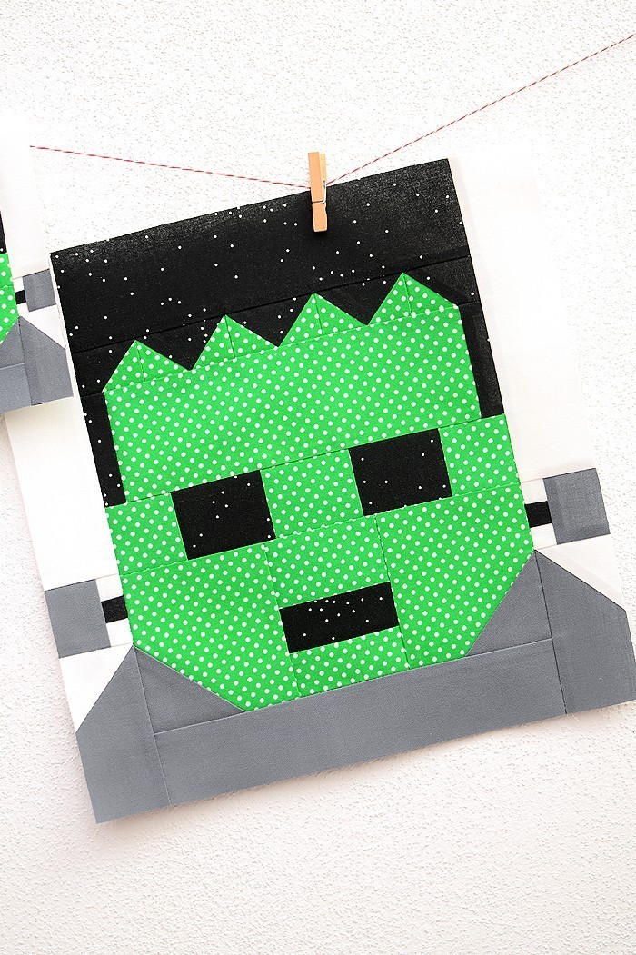 12 Inch Frankenstein quilt block hanging on a wall