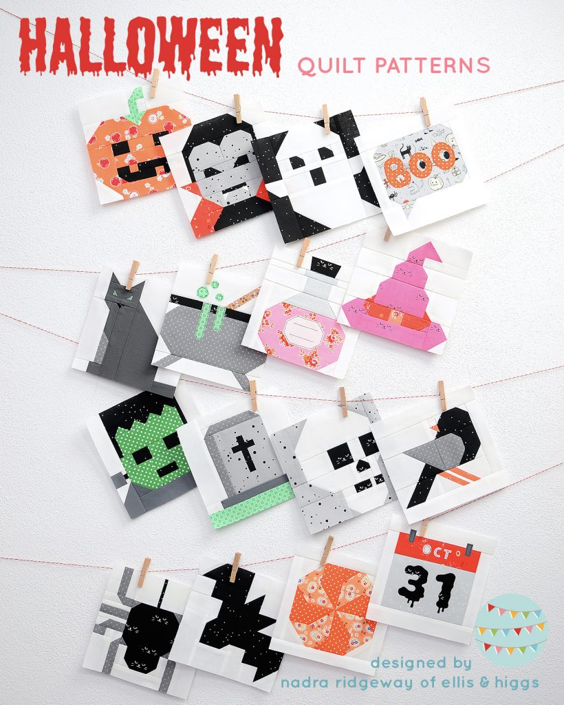 Sixteen Halloween quilt patterns hanging the wall.