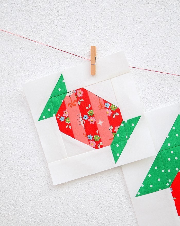 6 Inch Candy quilt block hanging on a wall