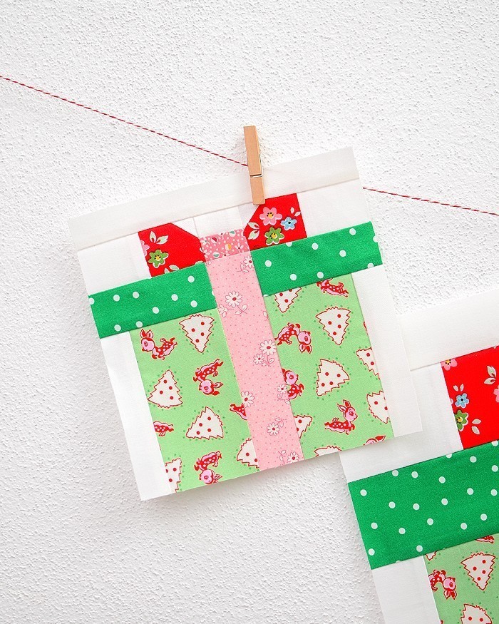 6 Inch Christmas Present quilt block hanging on a wall