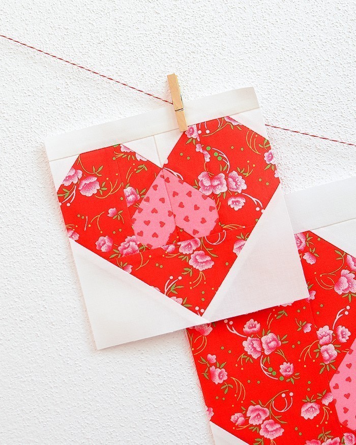 6 Inch Heart quilt block hanging on a wall