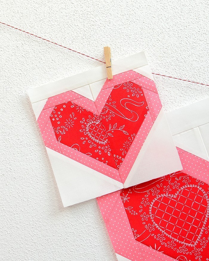 6 Inch Heart quilt block hanging on a wall