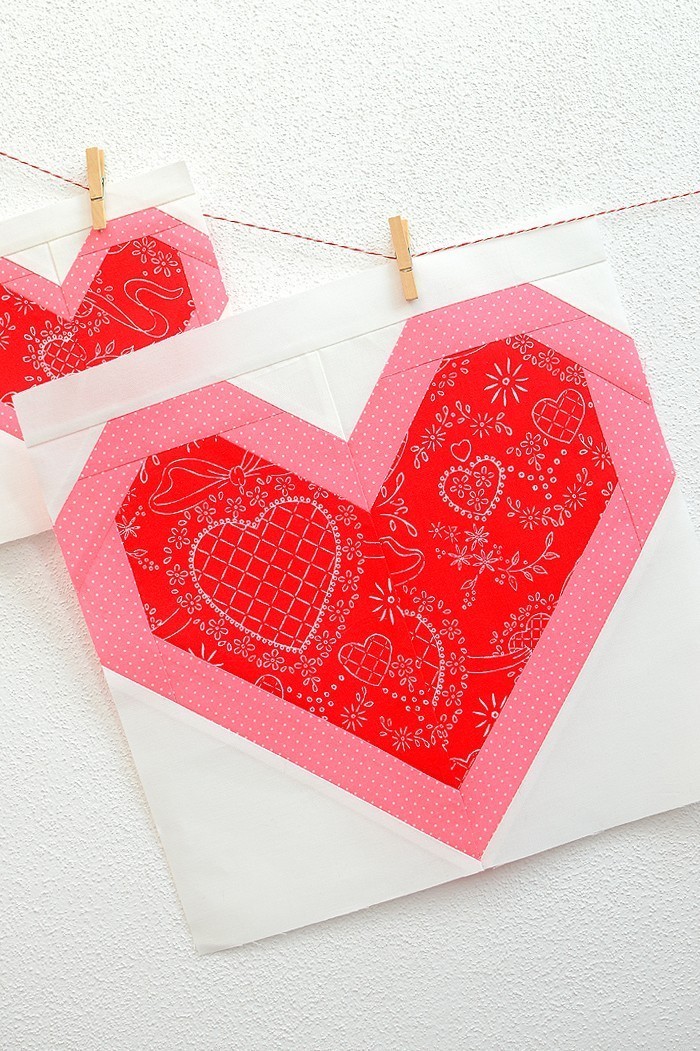 12 Inch Heart quilt block hanging on a wall