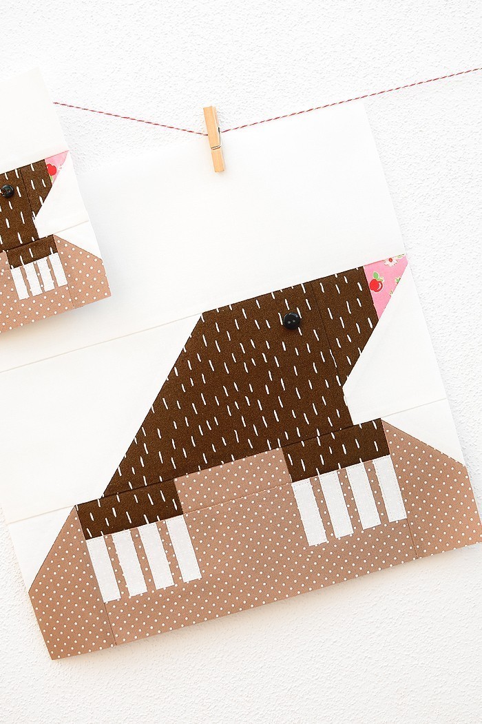 12 Inch Mole quilt block hanging on a wall