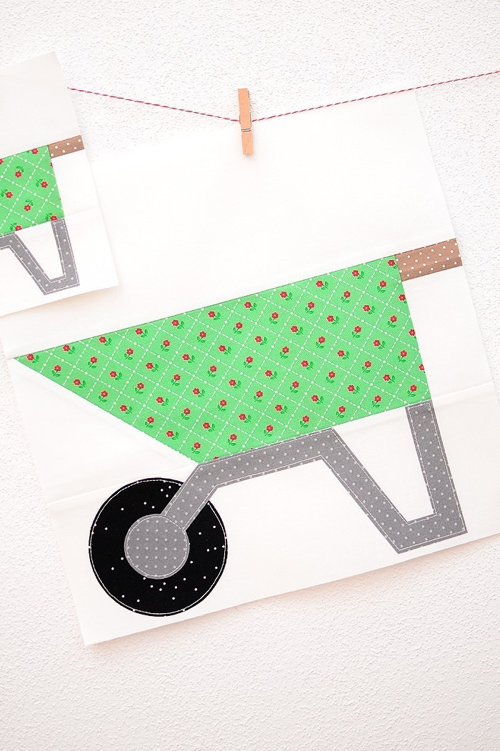 12 Inch Wheelbarrow quilt block hanging on a wall