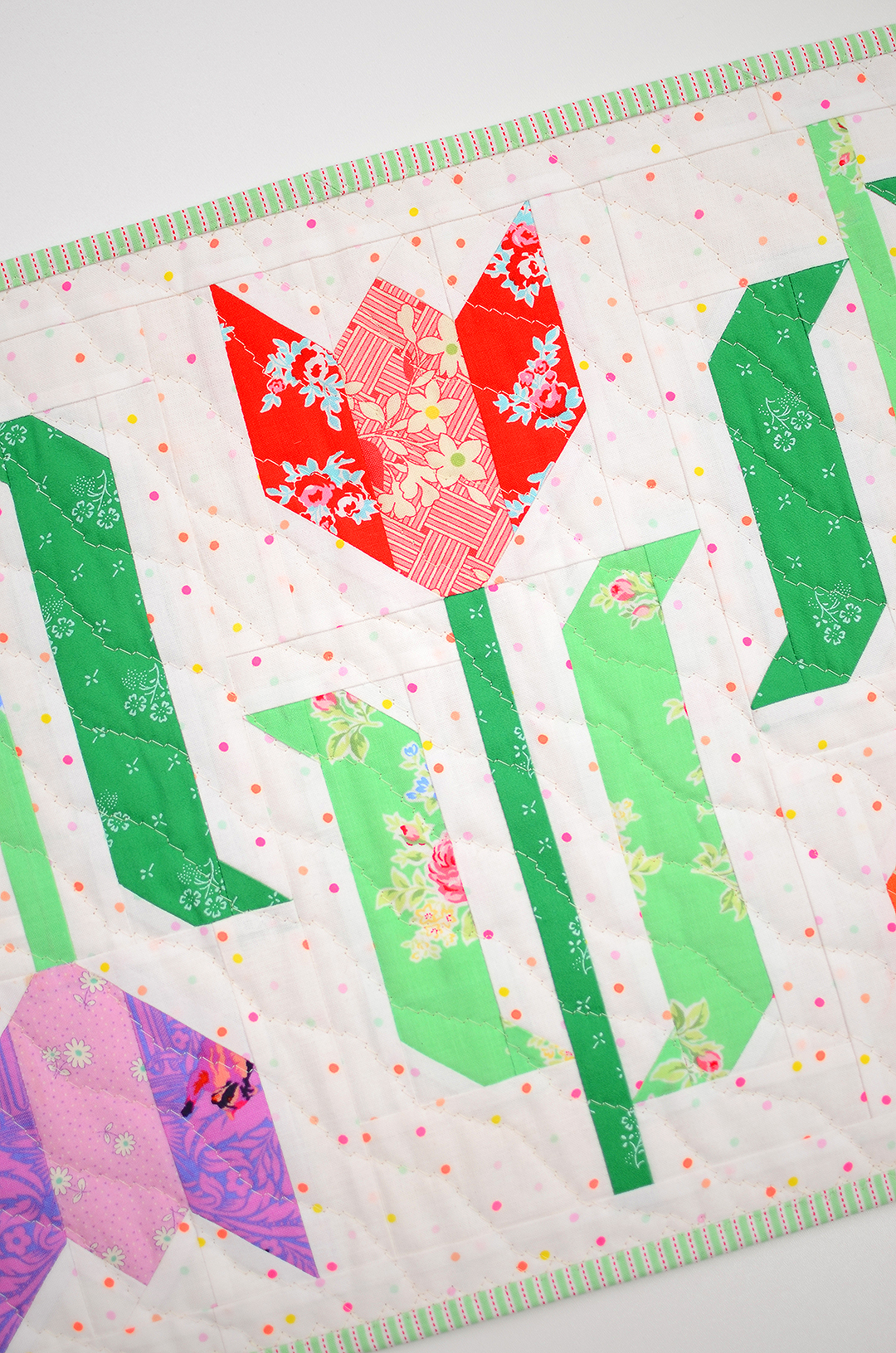 Tulip Table Runner - an easy quilt pattern by Nadra Ridgeway of ellis & higgs