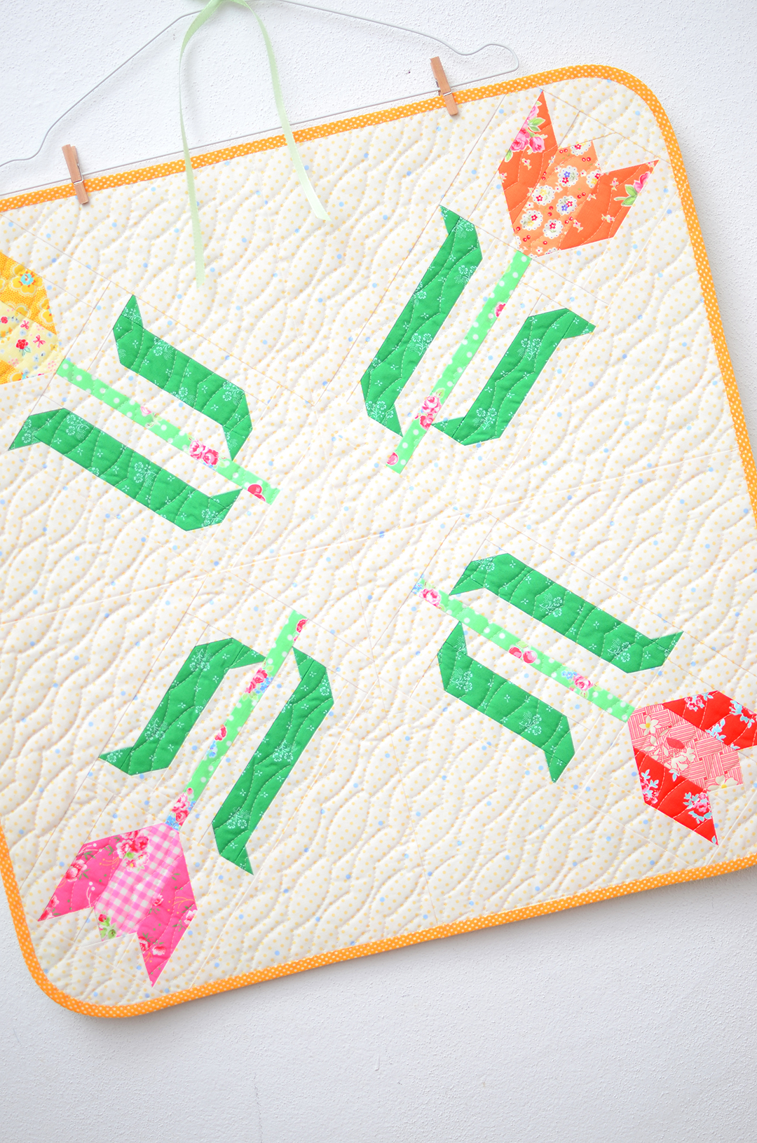 Tulip Table Topper - an easy quilt pattern by Nadra Ridgeway of ellis & higgs