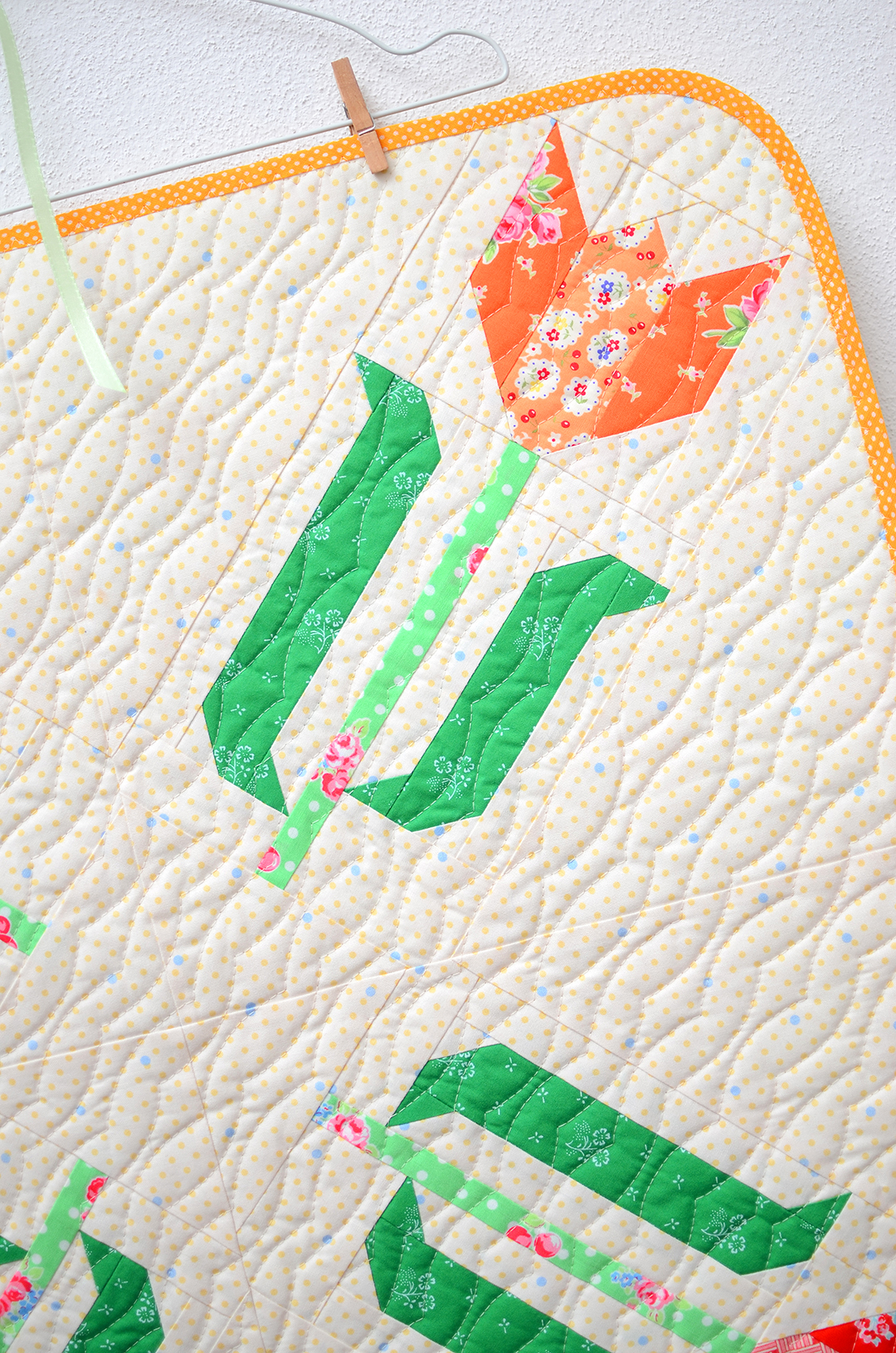 Tulip Table Topper - an easy quilt pattern by Nadra Ridgeway of ellis & higgs