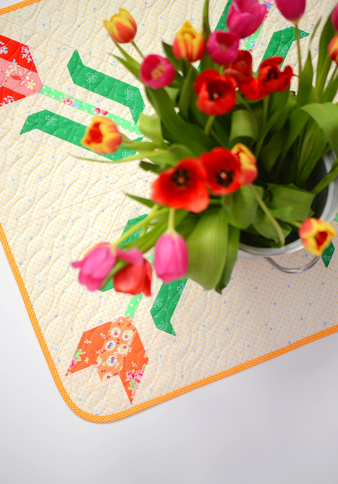 Tulip Table Topper - an easy quilt pattern by Nadra Ridgeway of ellis & higgs